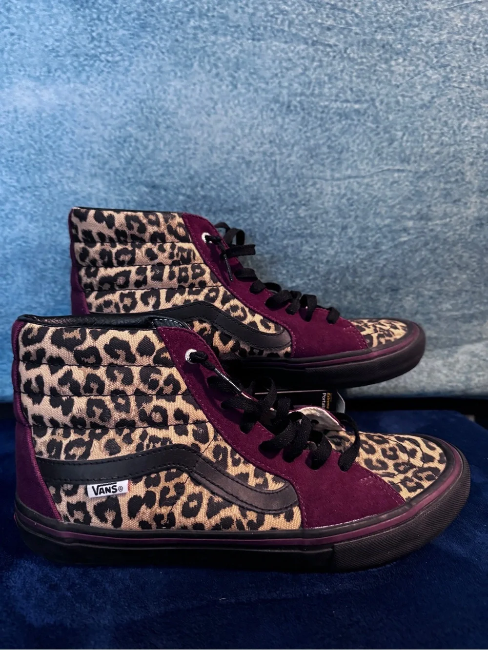Vans High Top Skate Shoes in Black with Leopard Trim and Burgundy Accents